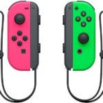 Nintendo Set di 2 controller Joy-Con sinistro/destro per Nintendo Switch - Autonomia fino a 20 ore - Vibrazione HD - Sensore di movimento e accelerometro - Pulsante di cattura - Sensore NFC per Amiibo - Telecamera a infrarossi - Colore rosa e verde neon