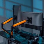 Aisens Supporto da tavolo professionale per gaming RGB - Girevole e inclinabile - Acciaio ad alta resistenza - Illuminazione ambientale - Compatibile con Vesa - Carico massimo 9 kg - Sistema passacavi - Colore nero/arancione - immagine 4
