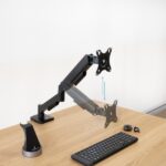 Tooq Supporto da tavolo con braccio articolato per monitor da 13"-32" - Girevole e inclinabile - Gestione dei cavi - Peso massimo 9 kg - VESA 100x100 mm - Colore nero - immagine 2