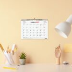 Finocam Neutro Calendario de Pared en Catalan - 16 Meses - Mes Vista - Formato S - 210x150mm - Espiral Doble Metalica - Papel de 120g/m2 - Listado de Festivos - Color Rojo/Blanco - immagine 3