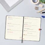 Finocam Minimal Agenda de Tapa Dura Internacional - 18 Meses - Semana Vista Horizontal - Formato M5 - 140x190mm - Papel Crema de 80g/m2 - Bolsillo Interior - Cierre con Goma - Color Negro - immagine 4