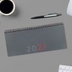 Finocam Planificador de Sobremesa Internacional - Anual 2027 - Semana Vista Vertical - 290x116mm - Espiral Doble - Tapa de Polipropileno - Esquinas Microperforadas - Papel de 80g/m2 - Color Gris - immagine 4